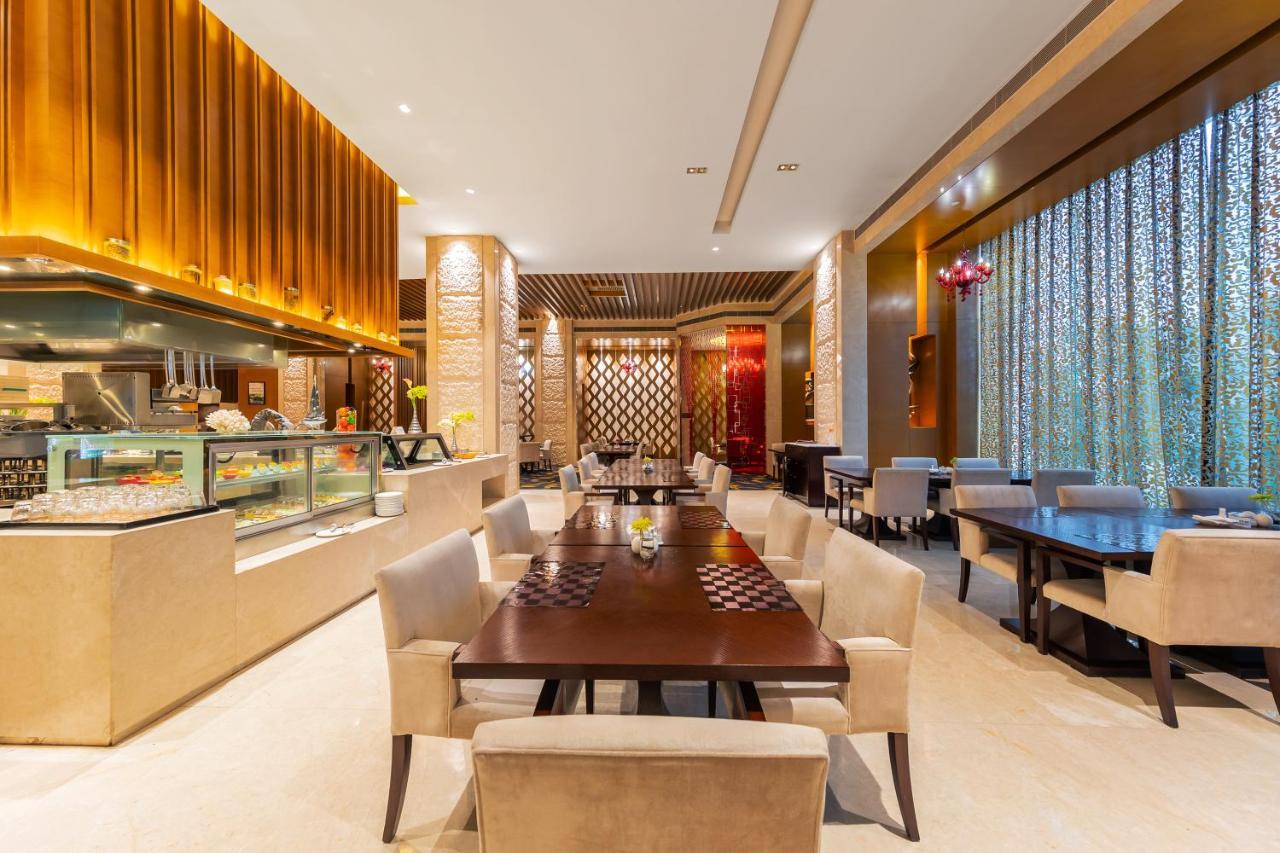 Movenpick Hotel Эньши Экстерьер фото