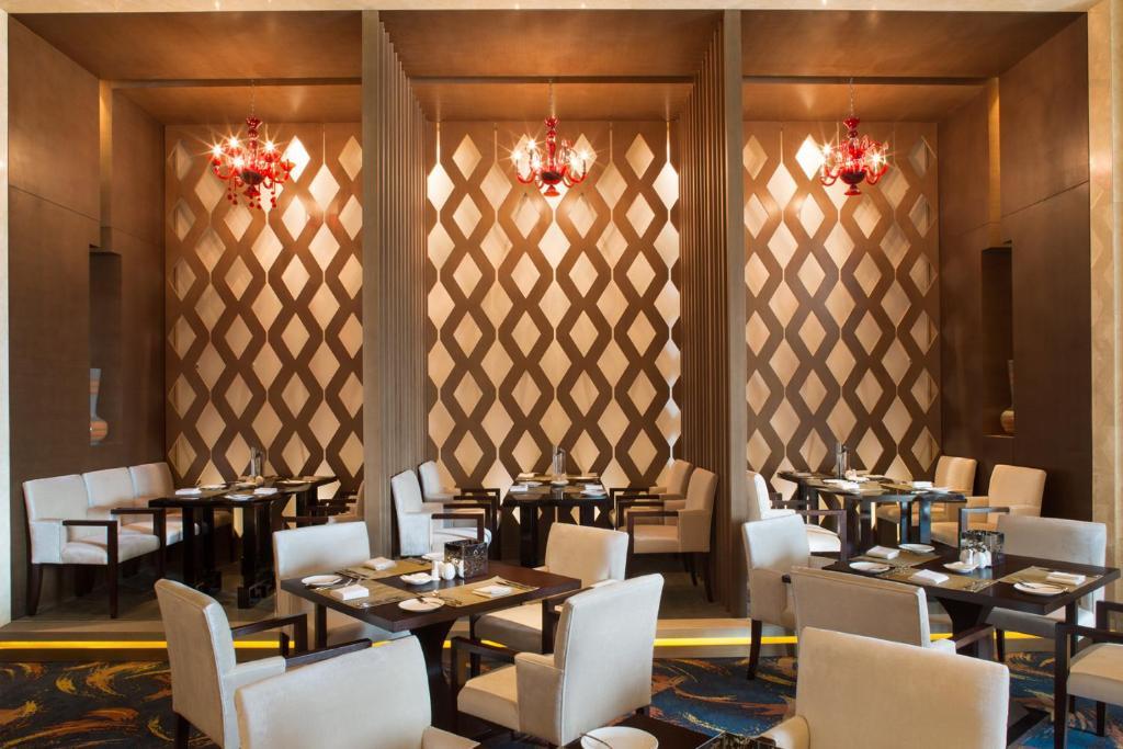Movenpick Hotel Эньши Экстерьер фото